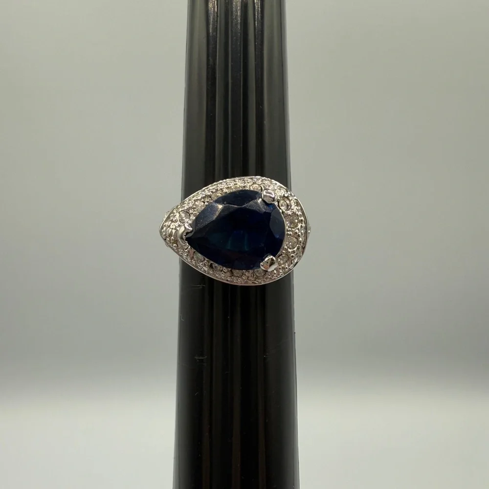 Beautiful Pear-Shaped Blue Glass Halo Ring with CZ Encrusted Base - Statement